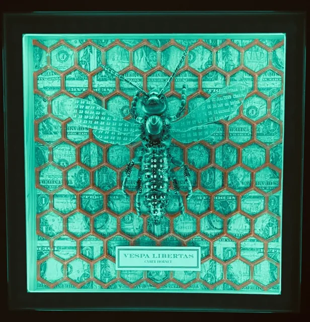 The complete artwork under green illumination.